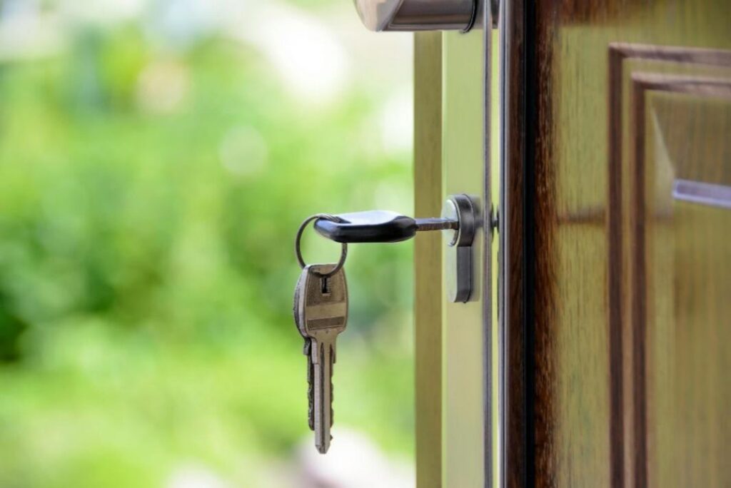 A key hanging from a door